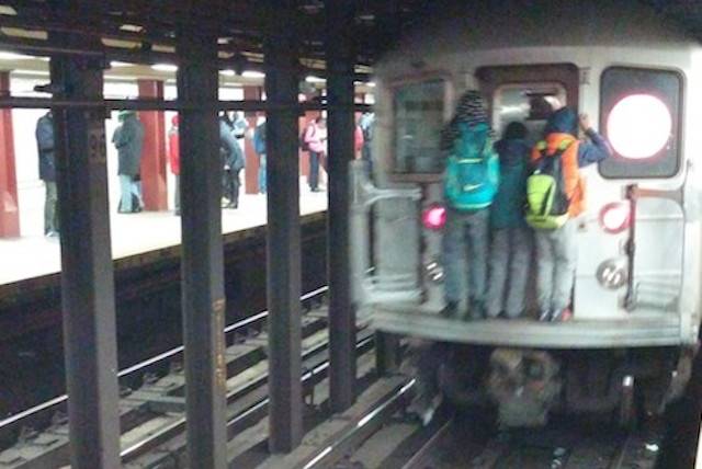 Some teens attempt to subway surf in a previous incident from March